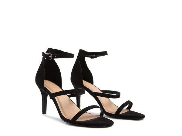 Black suede ankle strap high heel sandals with open toe on white background