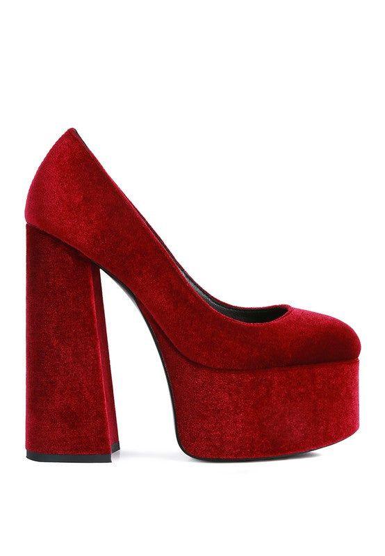 Red velvet chunky platform high heel pump on white background