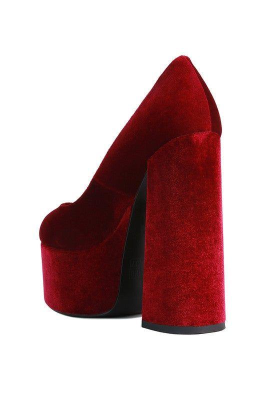Red velvet chunky platform high heel shoe on white background
