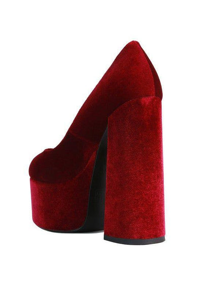 Red velvet chunky platform high heel shoe on white background