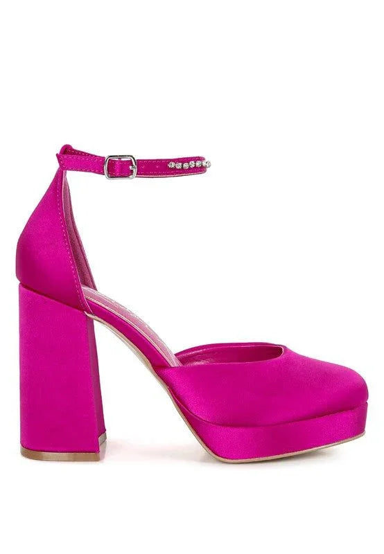 Fuchsia pink platform block heel dress shoe with ankle strap and rhinestone buckle