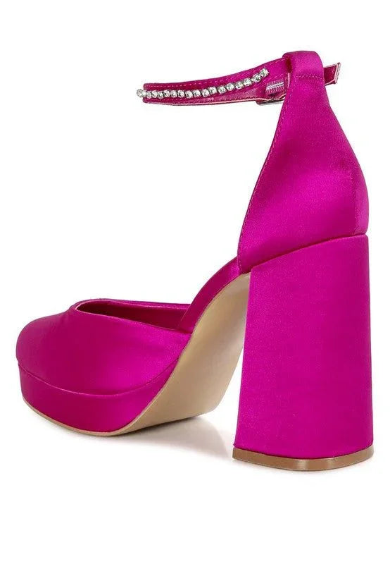 Hot pink satin block heel shoe with ankle strap embellished with rhinestones