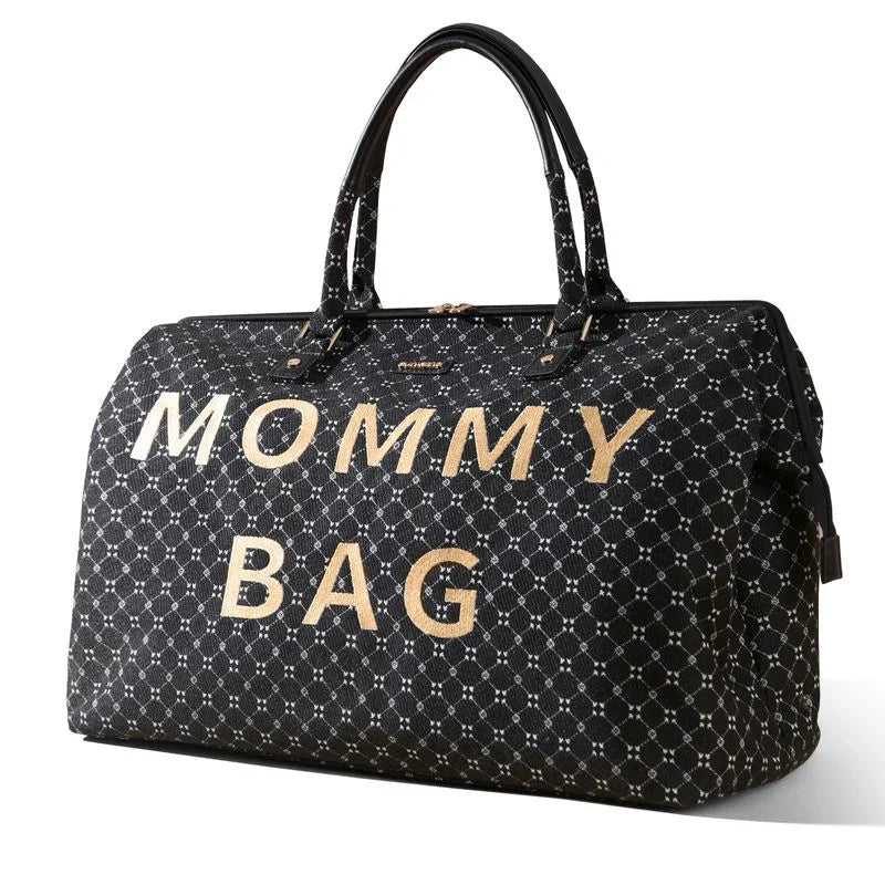 Large black mommy bag with geometric pattern and bold gold letters, two leather handles