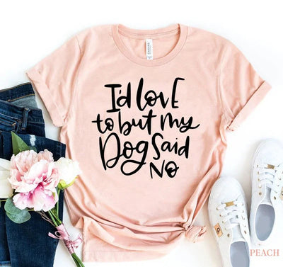Peach t-shirt with 'I'd love to but my dog said no' text, paired with jeans, flowers, white sneakers