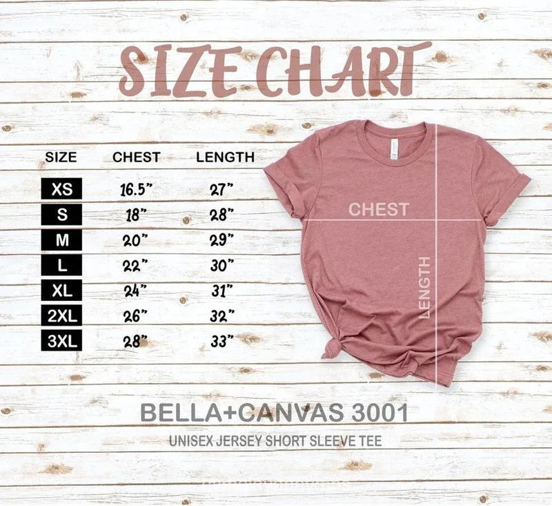 Bella+Canvas 3001 size chart with chest and length measurements, pink t-shirt on wood background