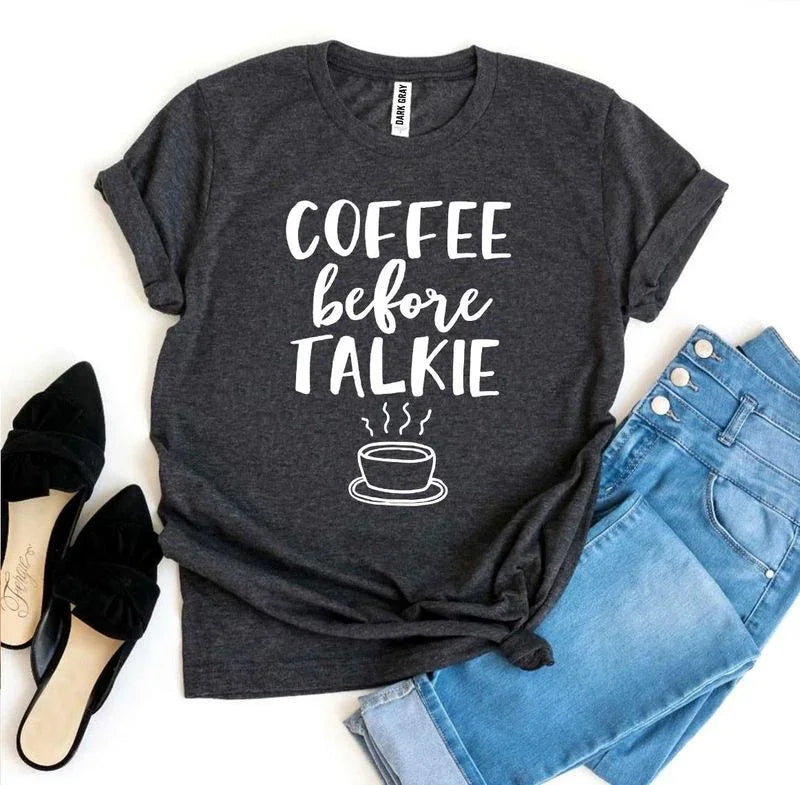 Dark gray 'Coffee before Talkie' t-shirt with jeans and black flats flat lay