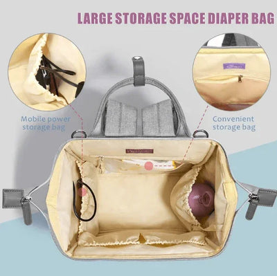 Large storage space diaper bag with multiple compartments and organized pockets.