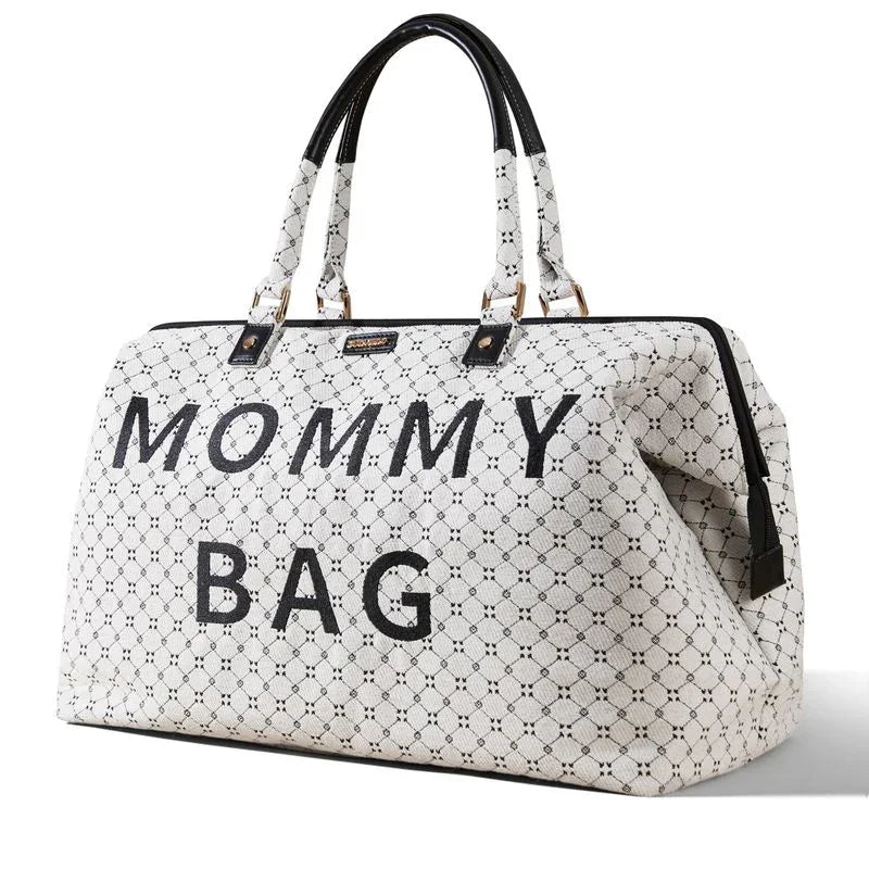 Large white mommy bag with black geometric pattern and black handles